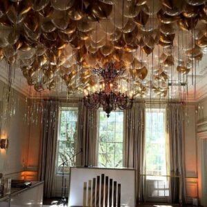 Gold white and transparent ceiling balloons in dubai